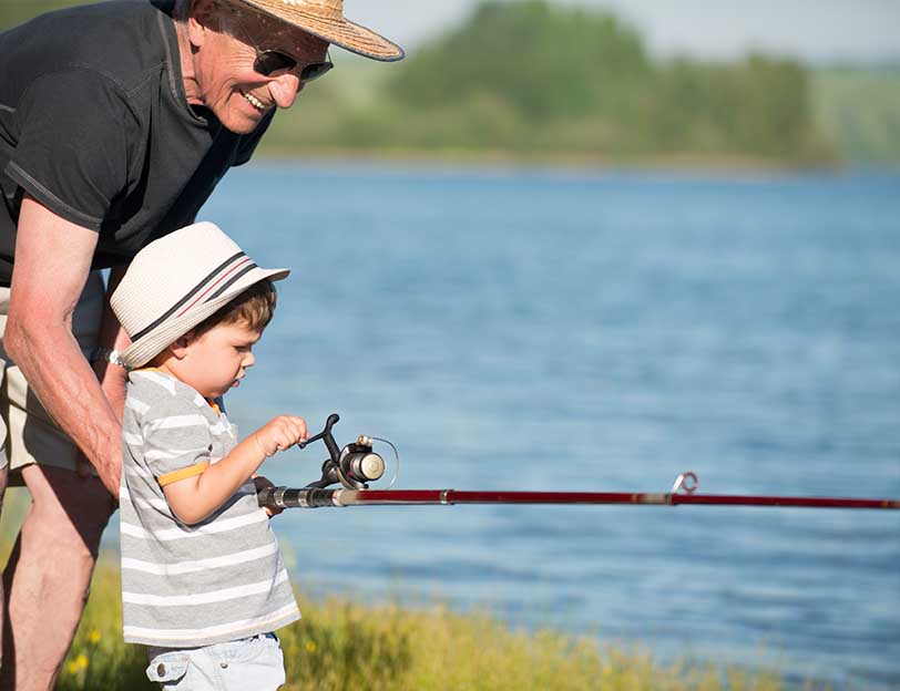 gandpa fishing with grandson