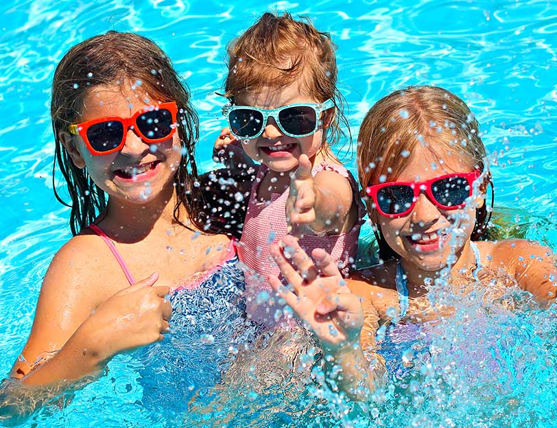 kids splashing fun in pool